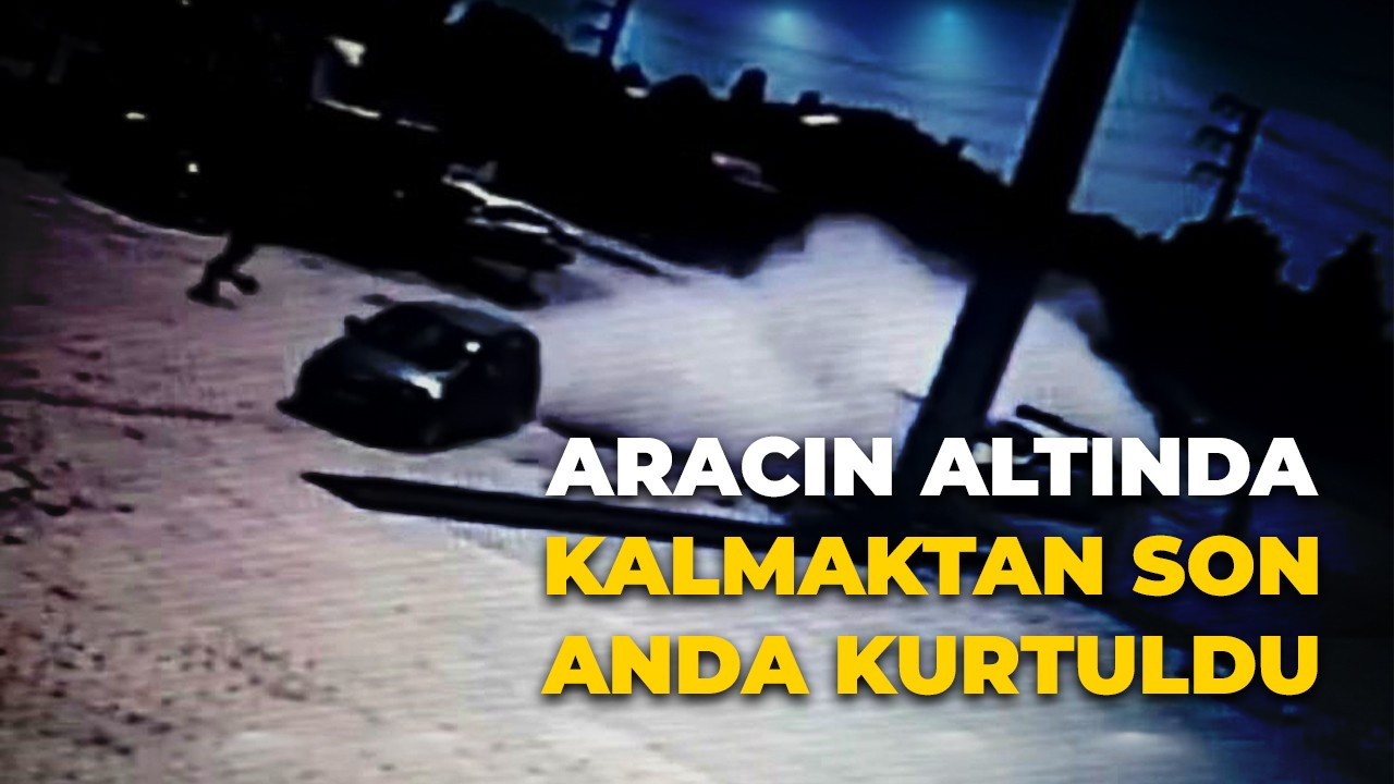 Aracın altında kalmaktan son anda kurtuldu