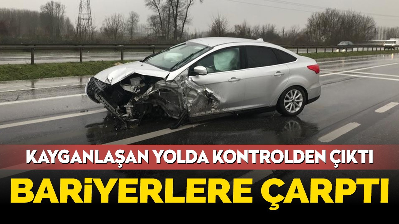 Kayganlaşan yolda kontrolden çıkan otomobil bariyerlere çarptı