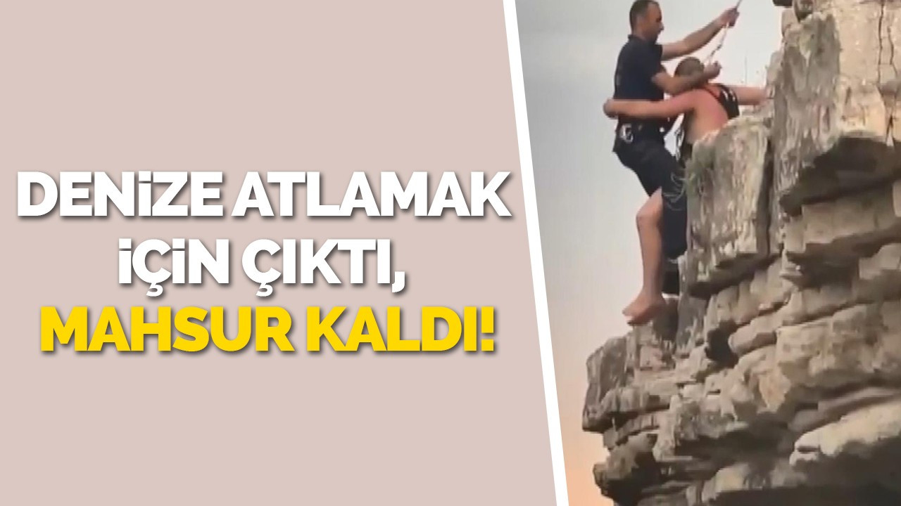 Denize atlamak için çıktı, mahsur kaldı!