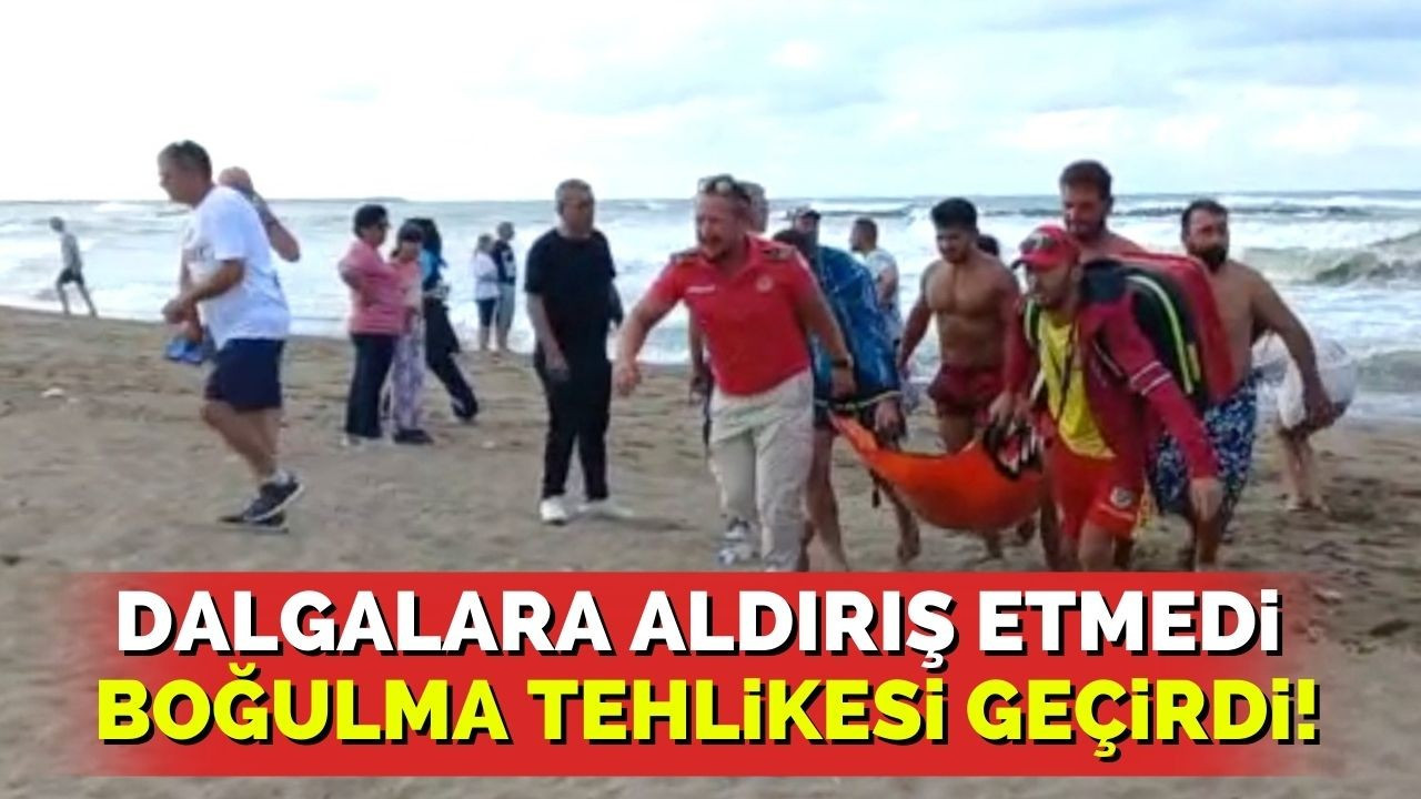 Dalgalara aldırış etmedi, boğulma tehlikesi geçirdi!